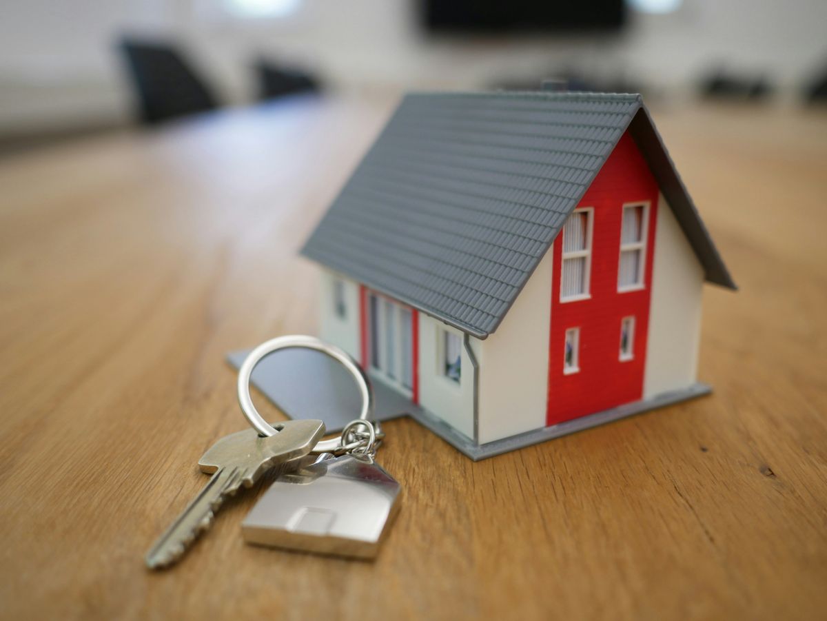 A house and keys representing home buying and mortgages