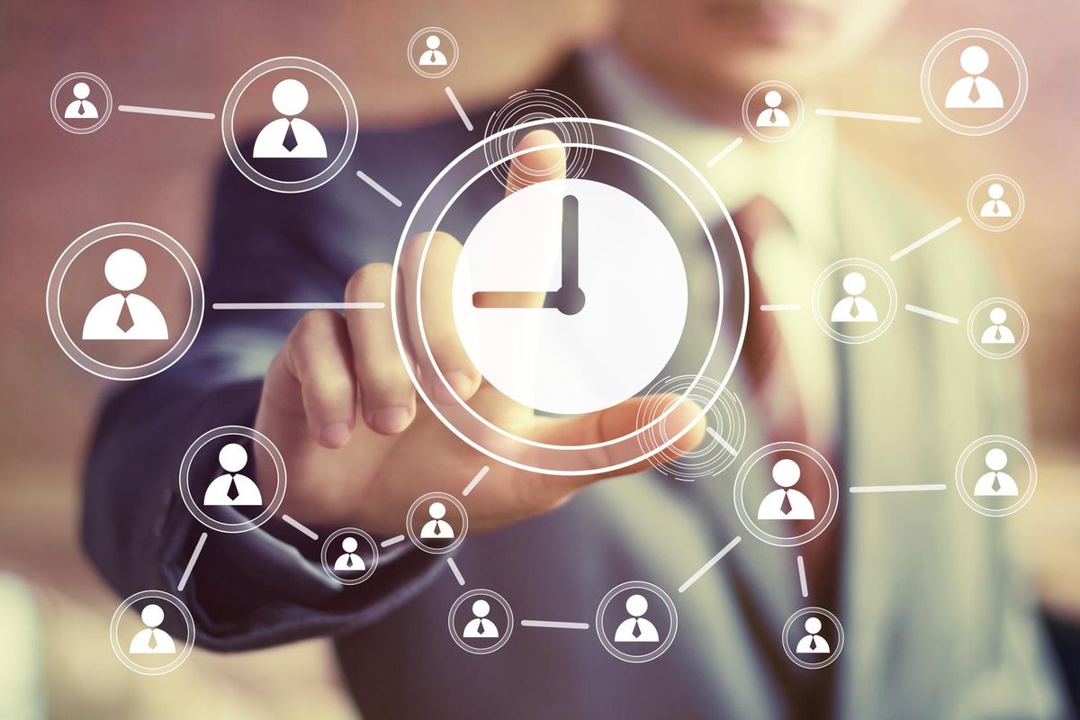 Businessman hand press web clock time sign button