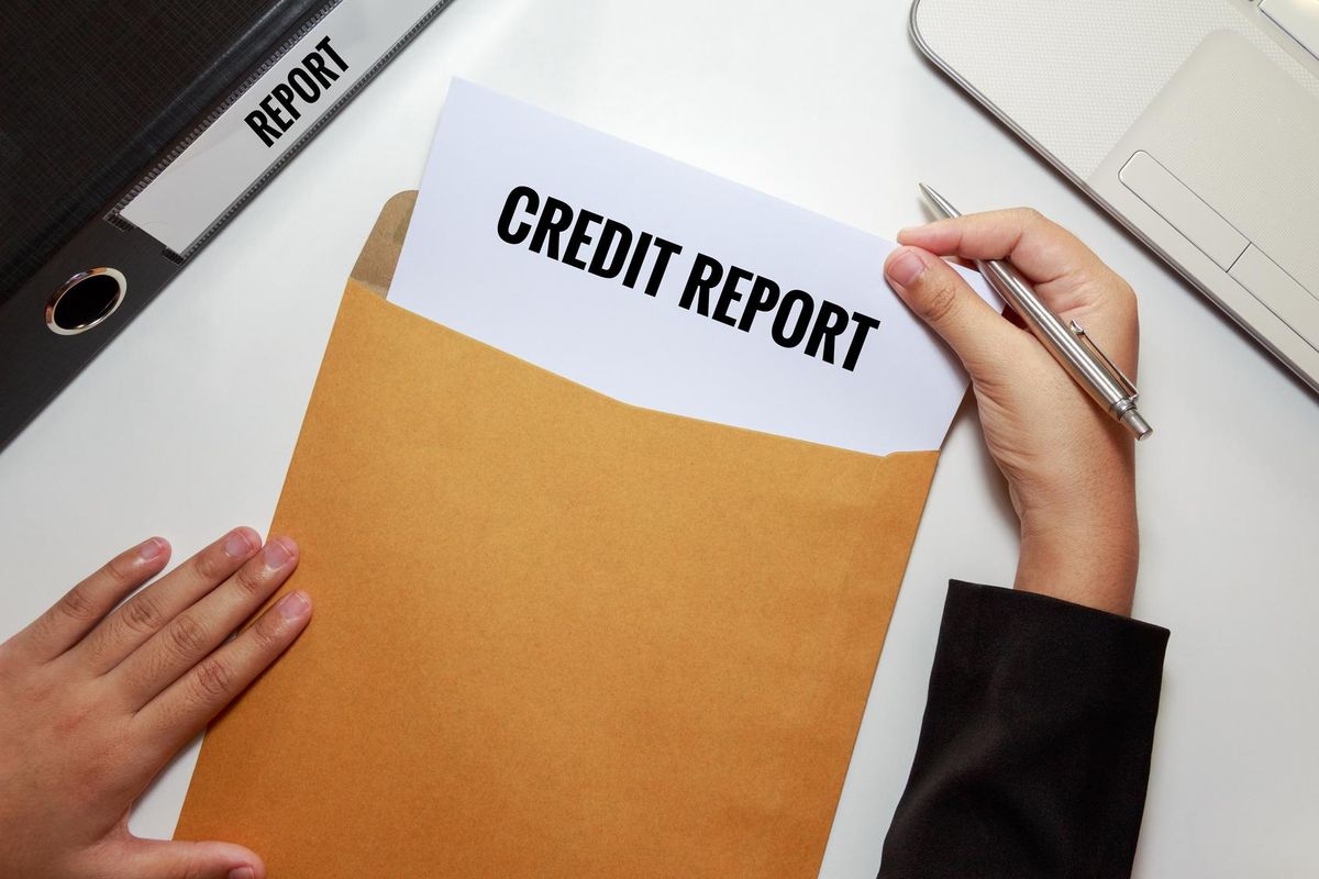 Businesswoman opening Credit report