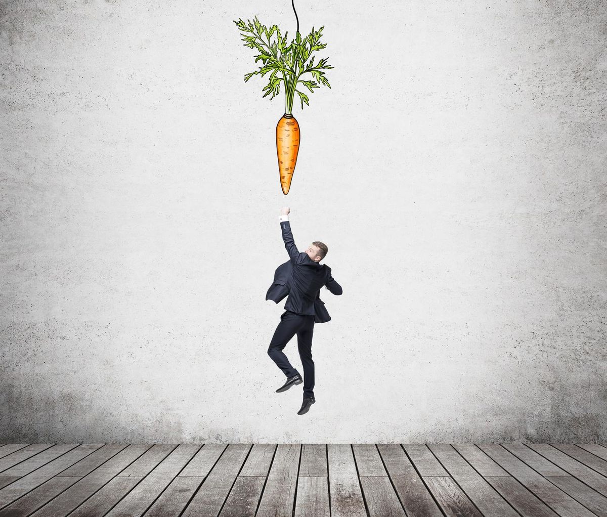 Man aiming at carrot reward