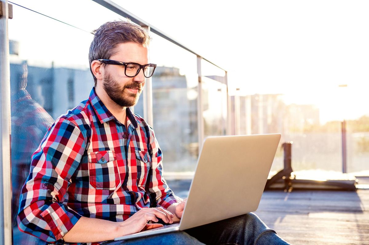 man working on laptop