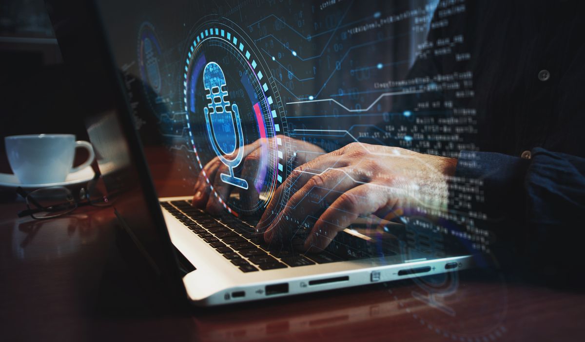 Podcaster using AI tools to produce a podcast on a laptop