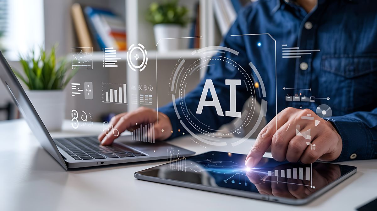 Small business owner Analyzing AI Data on Laptop and Tablet