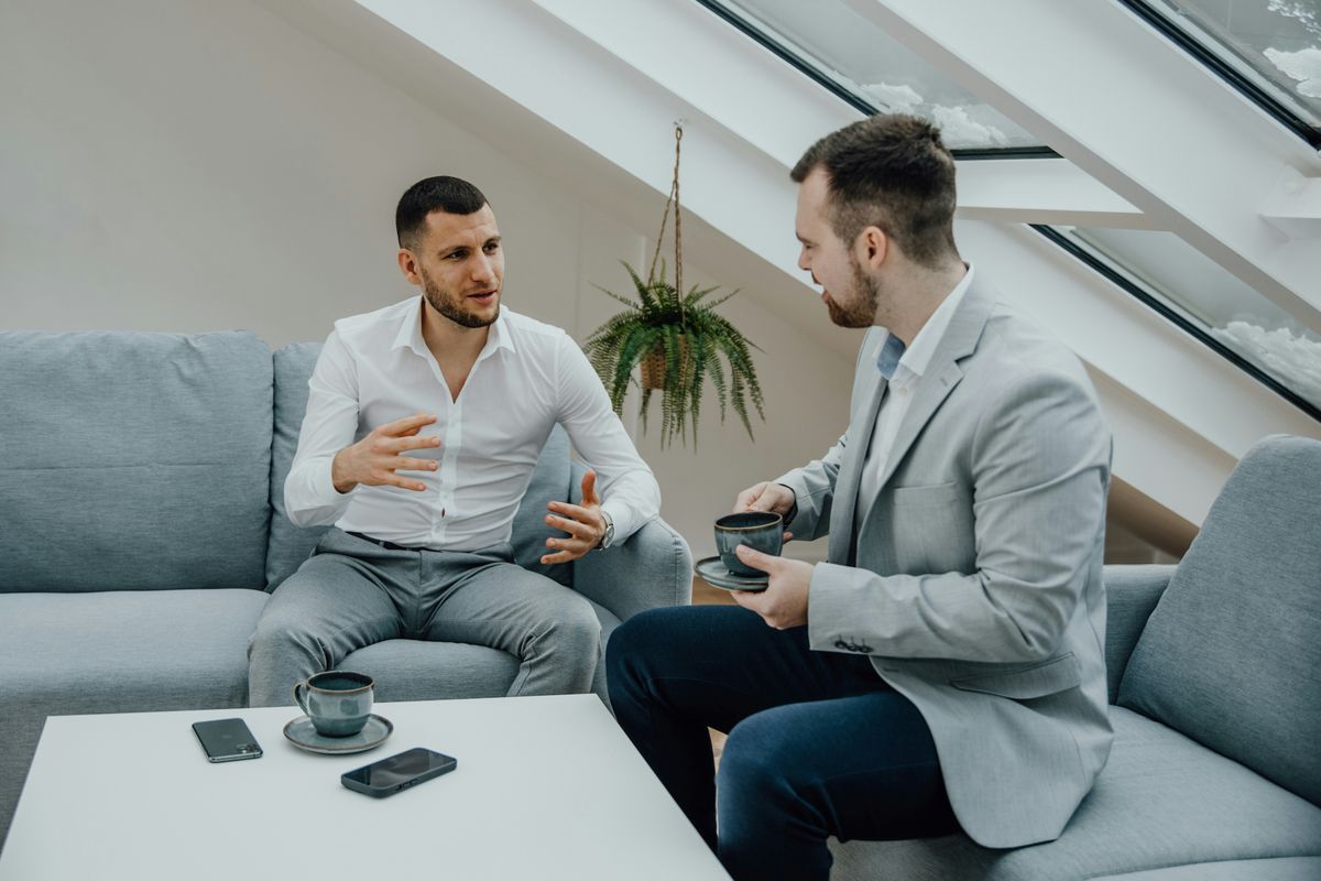 Startup founder talking to VC about raising capital