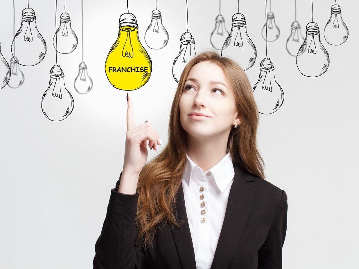 Woman evaluating a franchise