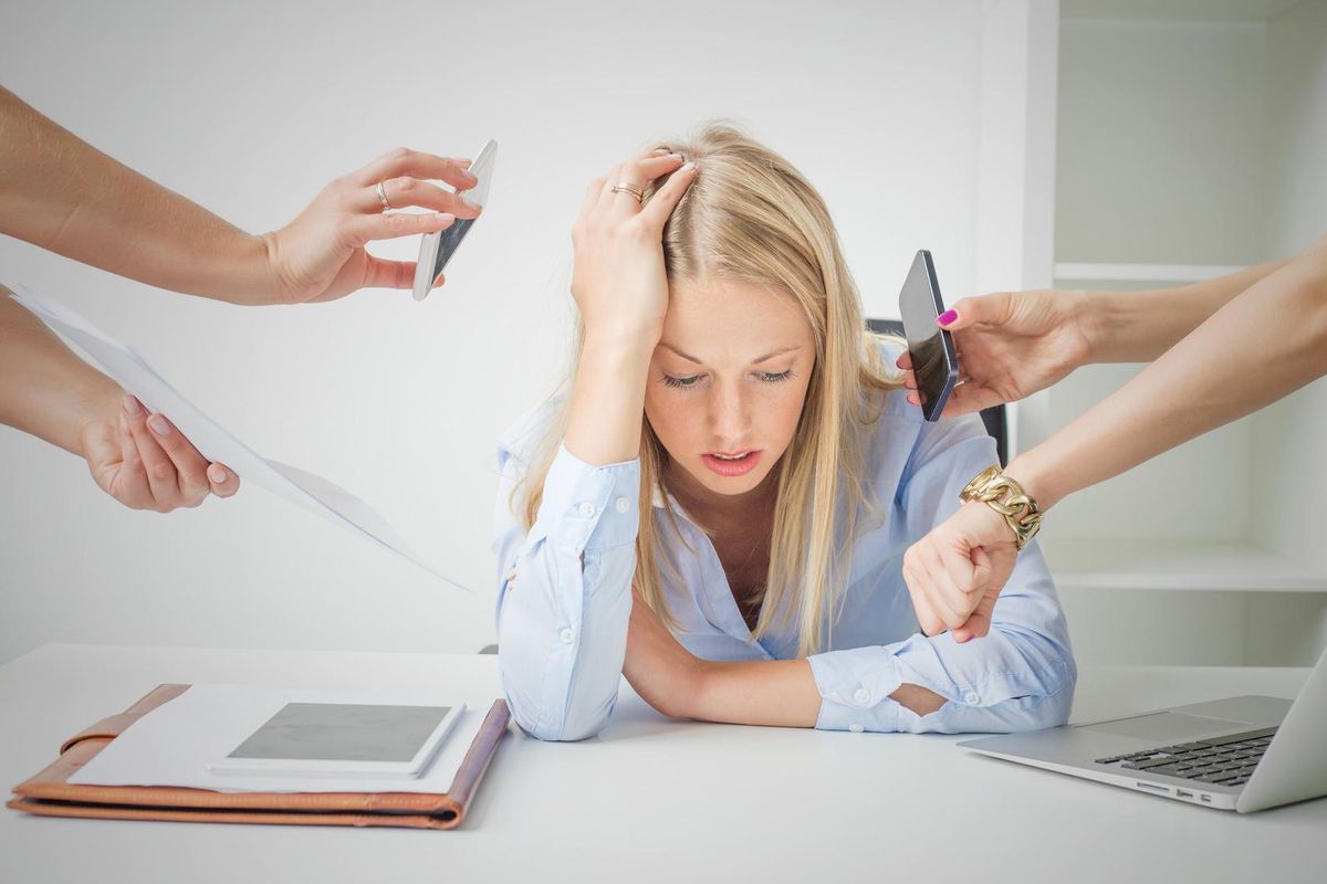 Woman overloaded with work