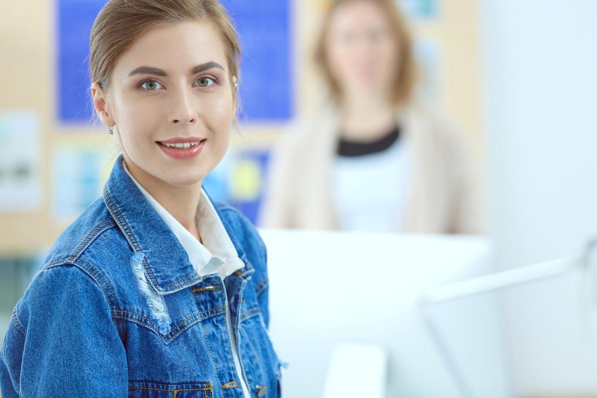 woman sitting near desk