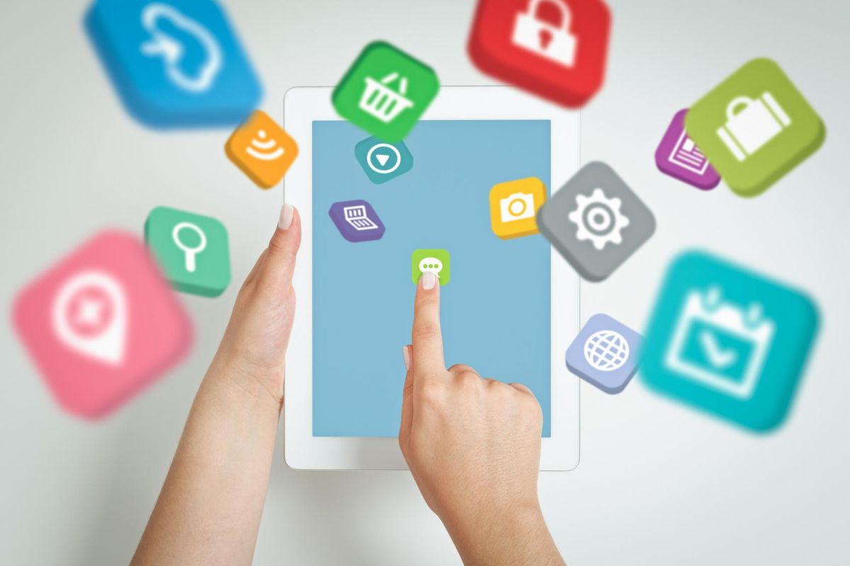 woman touching application icons